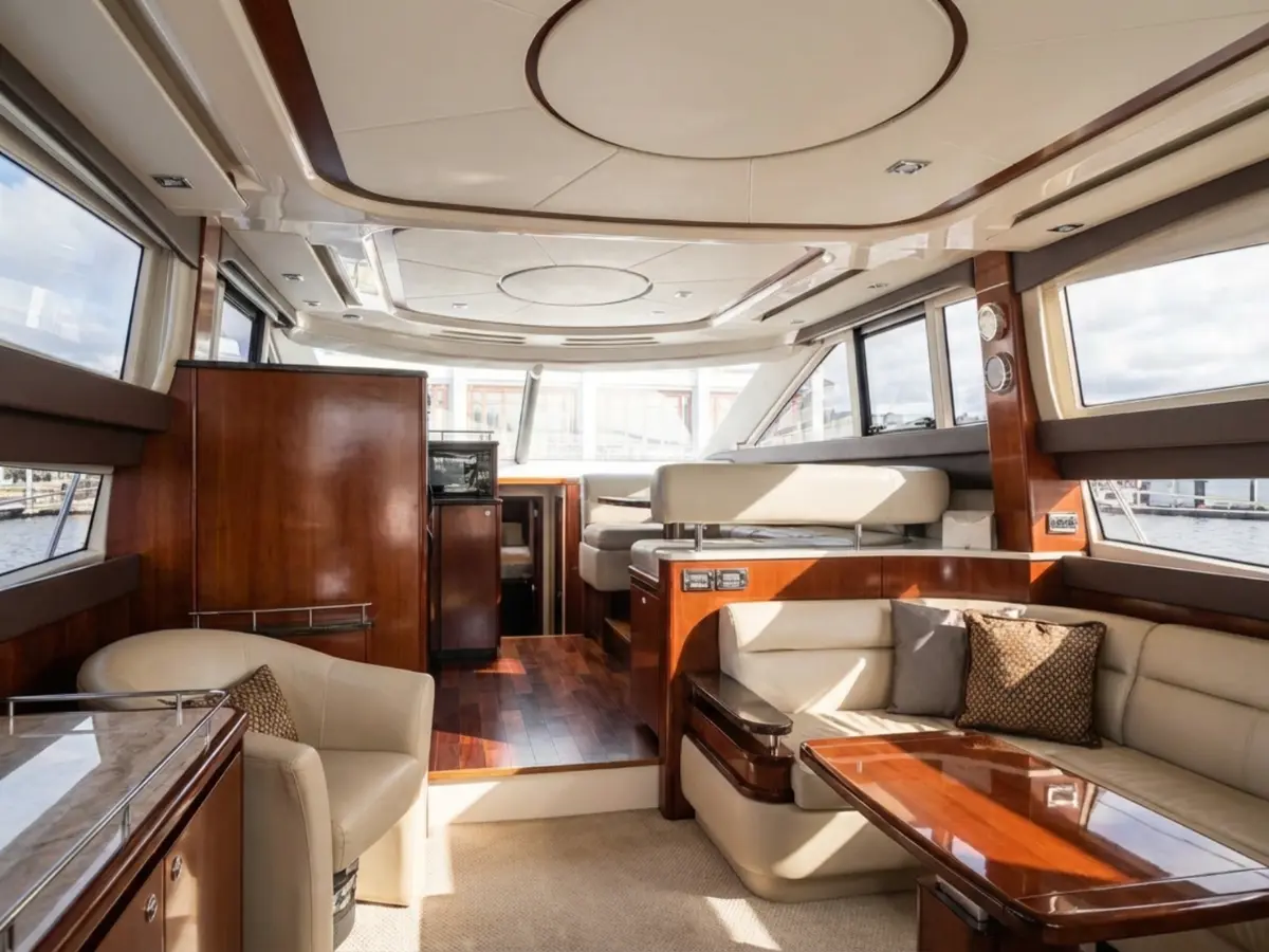 C Weed luxury yacht interior saloon with warm wood accents